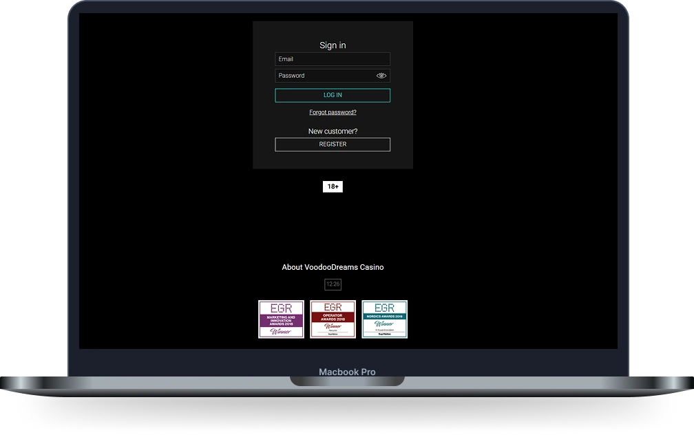 Voodoo Dreams Casino login screen displayed on a laptop with account sign in form